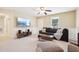 Relaxing living room with a large TV and comfortable seating at 105 N Bend Dr, Knightdale, NC 27545