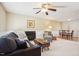 Cozy living room with a fireplace, comfortable seating, and a coffee table at 105 N Bend Dr, Knightdale, NC 27545