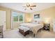 Spacious main bedroom with a king-size bed and large window at 105 N Bend Dr, Knightdale, NC 27545