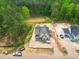Aerial view of new construction home and lot with pond nearby at 1116 Delilia Ln, Wake Forest, NC 27587