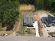 Stunning aerial view of a new construction home with a spacious lot and private pond at 1116 Delilia Ln, Wake Forest, NC 27587