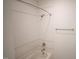 Bright bathroom featuring white subway tile, a shower, and a towel rack at 1116 Delilia Ln, Wake Forest, NC 27587