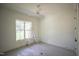 Bright bedroom with large window and ceiling fan, ready for personalization at 1116 Delilia Ln, Wake Forest, NC 27587