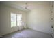 This bedroom has natural light and a ceiling fan at 1116 Delilia Ln, Wake Forest, NC 27587