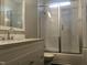 Modern bathroom with a glass shower and white vanity at 1312 Fay St, Durham, NC 27701