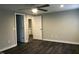 Bright bedroom with hardwood floors and access to bathroom at 1312 Fay St, Durham, NC 27701