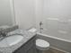 Bathroom with granite vanity and bathtub at 16 Holly Grove Ln, Lillington, NC 27546