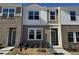 Modern two-story townhome with brick and siding exterior at 2052 Glen Crossing Dr, Durham, NC 27704