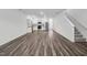 Open living room and kitchen with hardwood floors at 2054 Glen Crossing Dr, Durham, NC 27704