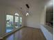 Sunlit dining area with hardwood floors and large windows at 2106 Pathway Dr, Chapel Hill, NC 27516