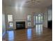 Spacious living room with hardwood floors and fireplace at 2106 Pathway Dr, Chapel Hill, NC 27516