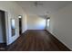 Bright main bedroom with hardwood floors and access to bathroom at 2106 Pathway Dr, Chapel Hill, NC 27516