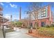 Renovated brick building with a smokestack, showcasing historical architecture and modern design at 2612 Ashe St, Durham, NC 27703