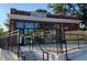 Sofia's Pizza building boasts a brick facade, expansive windows, and inviting signage for a delightful dining experience at 2612 Ashe St, Durham, NC 27703