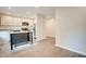 Bright, modern kitchen with stainless steel appliances and a granite countertop island at 2612 Ashe St, Durham, NC 27703
