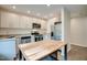 Well-lit modern kitchen features stainless steel appliances and a butcher block kitchen island at 2612 Ashe St, Durham, NC 27703