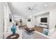 Bright open-concept living room featuring modern furnishings and hardwood floors at 2612 Ashe St, Durham, NC 27703