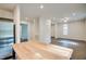 Spacious kitchen with a large kitchen island flowing into an open-concept living area at 2612 Ashe St, Durham, NC 27703