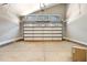 Well-lit garage featuring a modern garage door and a clean, spacious interior at 2662 Sledge Rd, Louisburg, NC 27549