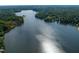 Expansive lake view with sparkling water and tree-lined shorelines at 2662 Sledge Rd, Louisburg, NC 27549