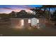Rear view of the house, showing a spacious backyard and additional features at 302 Ellen Dr, Knightdale, NC 27545