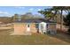 Brick house with backyard and shed at 302 Ellen Dr, Knightdale, NC 27545