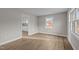 Bright and airy living room with hardwood floors and ample natural light at 302 Ellen Dr, Knightdale, NC 27545