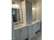 Elegant bathroom featuring dual vanities, plentiful storage, and modern fixtures for a spa-like experience at 318 Hinton St, Apex, NC 27502