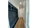 Convenient mudroom featuring built-in storage and seating for easy organization as you enter the home at 318 Hinton St, Apex, NC 27502
