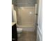 Clean bathroom with tub shower, toilet and vanity at 4519 Edwards Mill Rd # J, Raleigh, NC 27612
