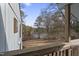 Peaceful pond view from the balcony, featuring trees and tranquil water at 5112 Flint Ridge Pl, Raleigh, NC 27609