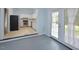 Bright kitchen features stainless steel appliances and access to backyard at 5617 Laurel Crest Dr, Durham, NC 27712