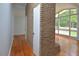 Living room with hardwood floors and large windows at 5617 Laurel Crest Dr, Durham, NC 27712