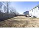 Large backyard with a wooden privacy fence at 601 Joe Gibson Dr, Gibsonville, NC 27249