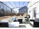Covered patio with comfortable seating and fire pit at 601 Joe Gibson Dr, Gibsonville, NC 27249