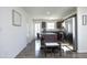 Modern kitchen with dark cabinets, granite counters, and stainless steel appliances at 601 Joe Gibson Dr, Gibsonville, NC 27249