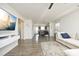 Open concept living space with hardwood floors and a view of the kitchen at 601 Joe Gibson Dr, Gibsonville, NC 27249