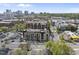 An aerial shot showcases the urban condominium community, highlighting its location within the cityscape at 615 W Peace St # 307, Raleigh, NC 27605