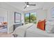Comfortable main bedroom with large window for natural light and an ensuite bath at 615 W Peace St # 307, Raleigh, NC 27605