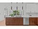 Modern kitchen boasting sleek cabinetry, stainless steel appliances, and an open-concept design at 615 W Peace St # 307, Raleigh, NC 27605