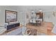 Inviting living space with modern decor, wood floors and a stylish dining area that leads into a modern kitchen at 615 W Peace St # 307, Raleigh, NC 27605