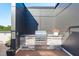 The outdoor kitchen features a stone base and stainless steel grill, perfect for barbecues and entertaining at 615 W Peace St # 307, Raleigh, NC 27605