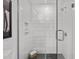 Contemporary shower with unique tiled floor and a rain-style shower head at 615 W Peace St # 307, Raleigh, NC 27605