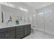 Modern bathroom with double vanity, large shower and marble tile floors at 712 Jamescroft Way # 26, Rolesville, NC 27571
