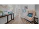 Elegant hallway featuring a comfortable armchair and decorative artwork at 712 Jamescroft Way # 26, Rolesville, NC 27571