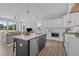 Spacious kitchen with white cabinets, large island, and stainless steel appliances at 712 Jamescroft Way # 26, Rolesville, NC 27571