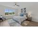 Spacious main bedroom with large windows, a comfy bed and plenty of natural light at 712 Jamescroft Way # 26, Rolesville, NC 27571