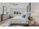 Bright bedroom with a king-size bed, large windows and dresser at 712 Jamescroft Way # 26, Rolesville, NC 27571