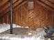 View of unfinished attic with insulation, ductwork and wooden walls at 734 Baker St, Oxford, NC 27565