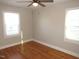 Bright room featuring hardwood floors and natural light, ready for personalization and new memories at 734 Baker St, Oxford, NC 27565